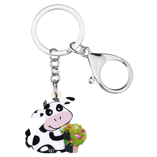 Porte-clés en acrylique représentant une vache laitière